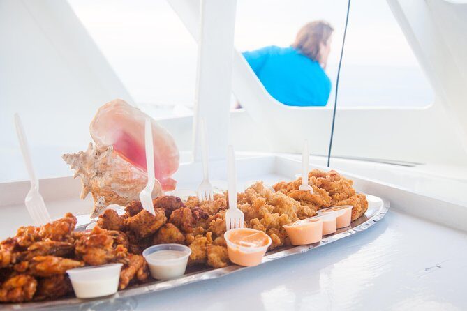 2 Hour Private Sunset Catamaran Sailing Charter from Grace Bay, Providenciales - Snacks, champagne, and the drink plan that keeps the mood going