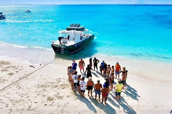 4hour Group Half Day Snorkeling Excursion in Grace Bay - Stop 1: Grace Bay Water Time and Reef Intro