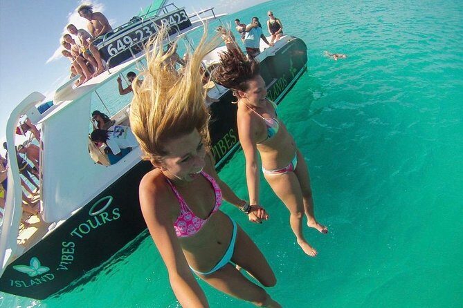 4hour Group Half Day Snorkeling Excursion in Grace Bay - Stop 3 Back at Grace Bay: Rooftop Jump Board and Water Slides