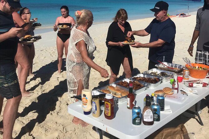7 Hour Private Catamaran Sail, Snorkel and Beach BBQ Grace Bay, Providenciales - Indigenous rock iguanas: Sandy & Rocky plus Iguana Island