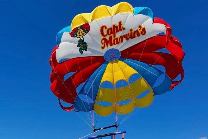 Capt Marvin Watersports / Parasail - Private Tour - What the flight feels like: dry option, optional dip, and sea-life spotting
