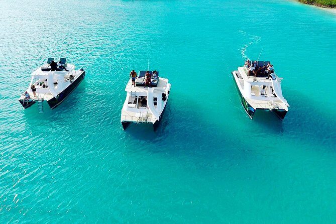 Full Day Beach BBQ Lunch & Snorkeling Excursion in Grace Bay - Half Moon Bay and the island hopping rhythm