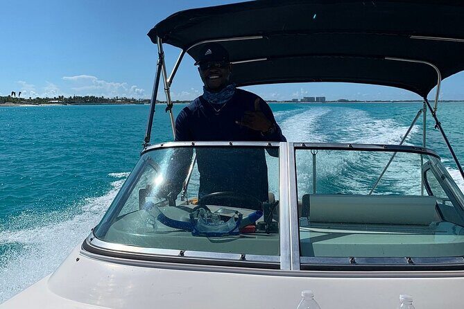 Half Day Private Charter Tour Turks and Caicos - Stop 3: Grace Bay Beach cruise with snacks and a calmer finish