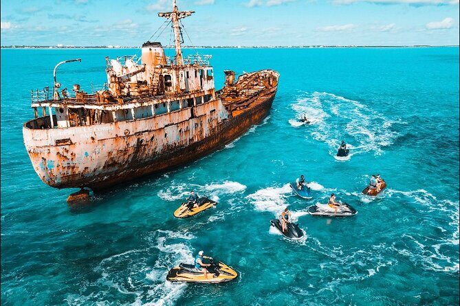 Jet Skiing around La famille ship and smaller pristine cays - La Famille Express: the shipwreck stop you can actually feel