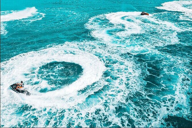 Jet Skiing around La famille ship and smaller pristine cays - Iguana Island, Half Moon Bay, and the sandbar time you’ll remember