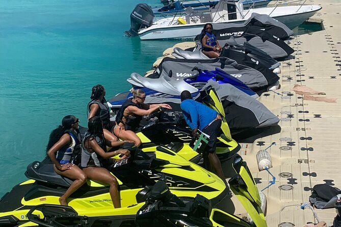 Jet Skiing around La famille ship and smaller pristine cays - Price and value: $350 per group plus transport and tips
