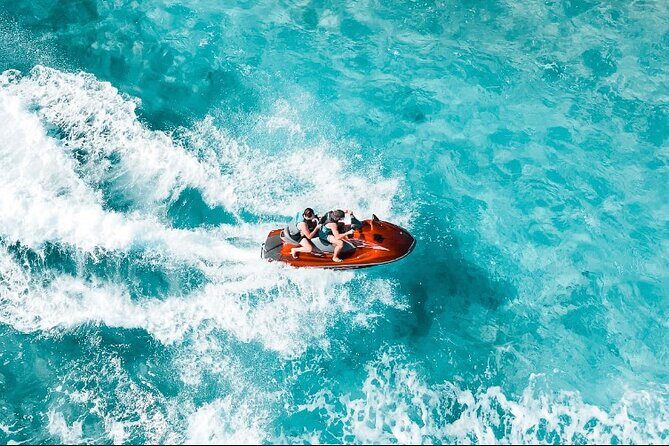 Jet Skiing around La famille ship and smaller pristine cays - Small group size (max 18) and what it means for safety
