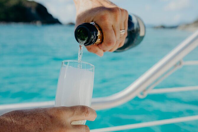 Lady Grace Signature Catamaran Sunset Sail from Ritz-Carlton - On the water: open bar, hors d’oeuvres, and that slow sunset drift