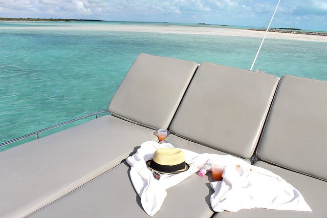 Private 4 Hour Power Catamaran Excursion in Grace Bay - What the rooftop lounge is really for (beyond looks)