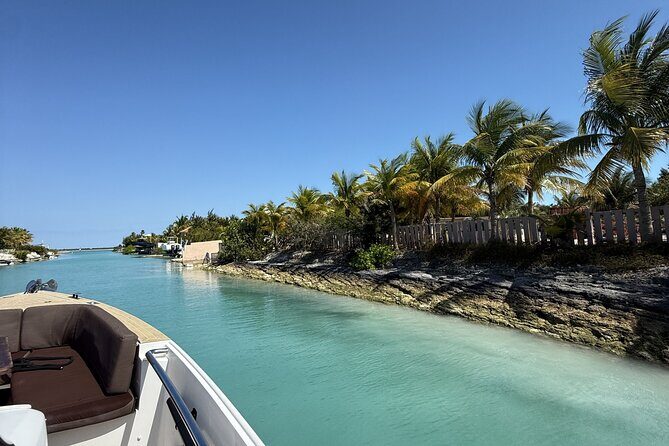 Private Afternoon Tour Fjord 38 Ben - Stop 4: Grace Bay Beach views—horizon cruising and an optional walk