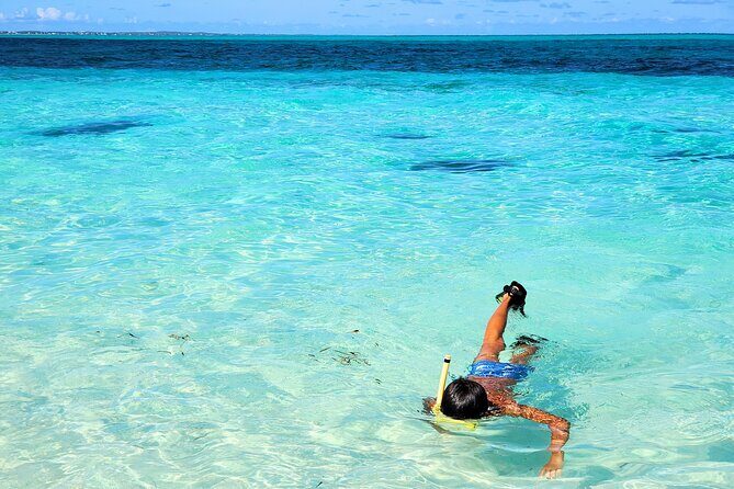 Private Boat Tour with Snorkeling, Island Hopping, and Noahs Ark - Stop 1: Long Bay Beach and the Shipwreck Photo Moment