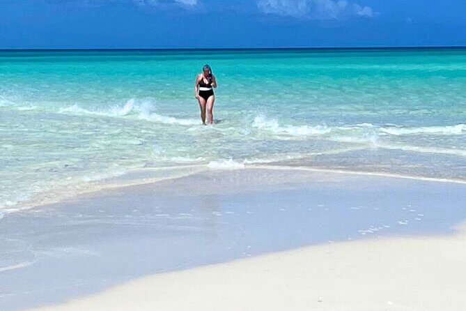 Private Boat Tour with Snorkeling, Island Hopping, and Noahs Ark - Stop 3: Grace Bay Beach Snorkeling Near Shore