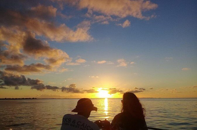 Private Sunset Cruise in Grace Bay - Drinks and snacks: cheese, wine, and rum punch on deck
