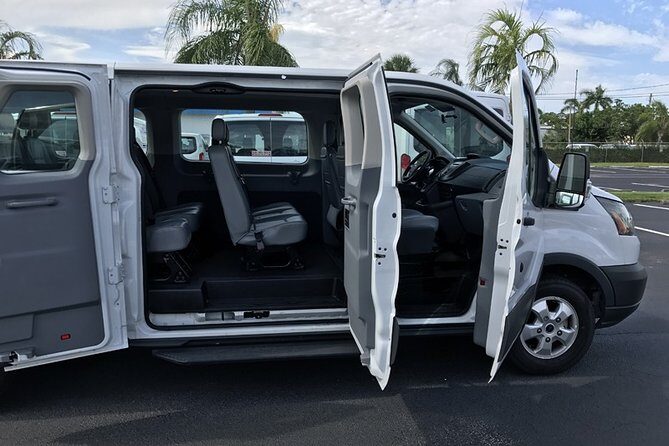 Providenciales Private Group Round Trip Airport Transfer - The Beverage Detail: Cold Rum Punch, Local Beer, or Cranberry-Vodka (For a Fee)
