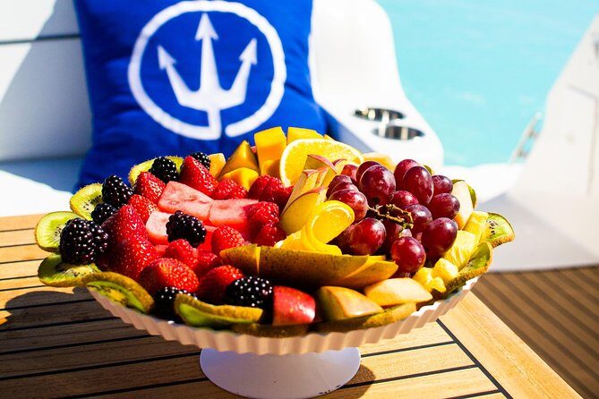Sunset Dinner Cruise Private Group - The boat setup: wet bar, sunpads, and room to move
