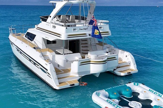 Turks and Caicos Full-Day Luxury Private Yacht Charter - Getting to the water: Grace Bay sailing and the reef-focused start