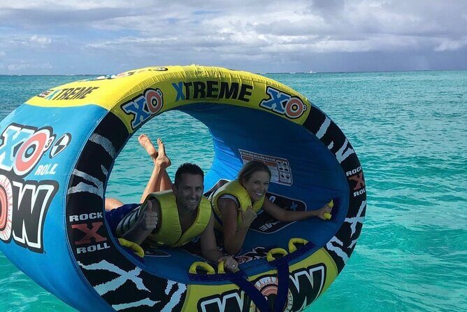 Wow Extreme Tube on Gracebay Beach Turks and Caicos Islands - The riding setup: life jackets, lying down, and holding on